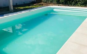 Casa en Villa Carlos Paz con Pileta , Quincho y Jardín a Pasos del Centro